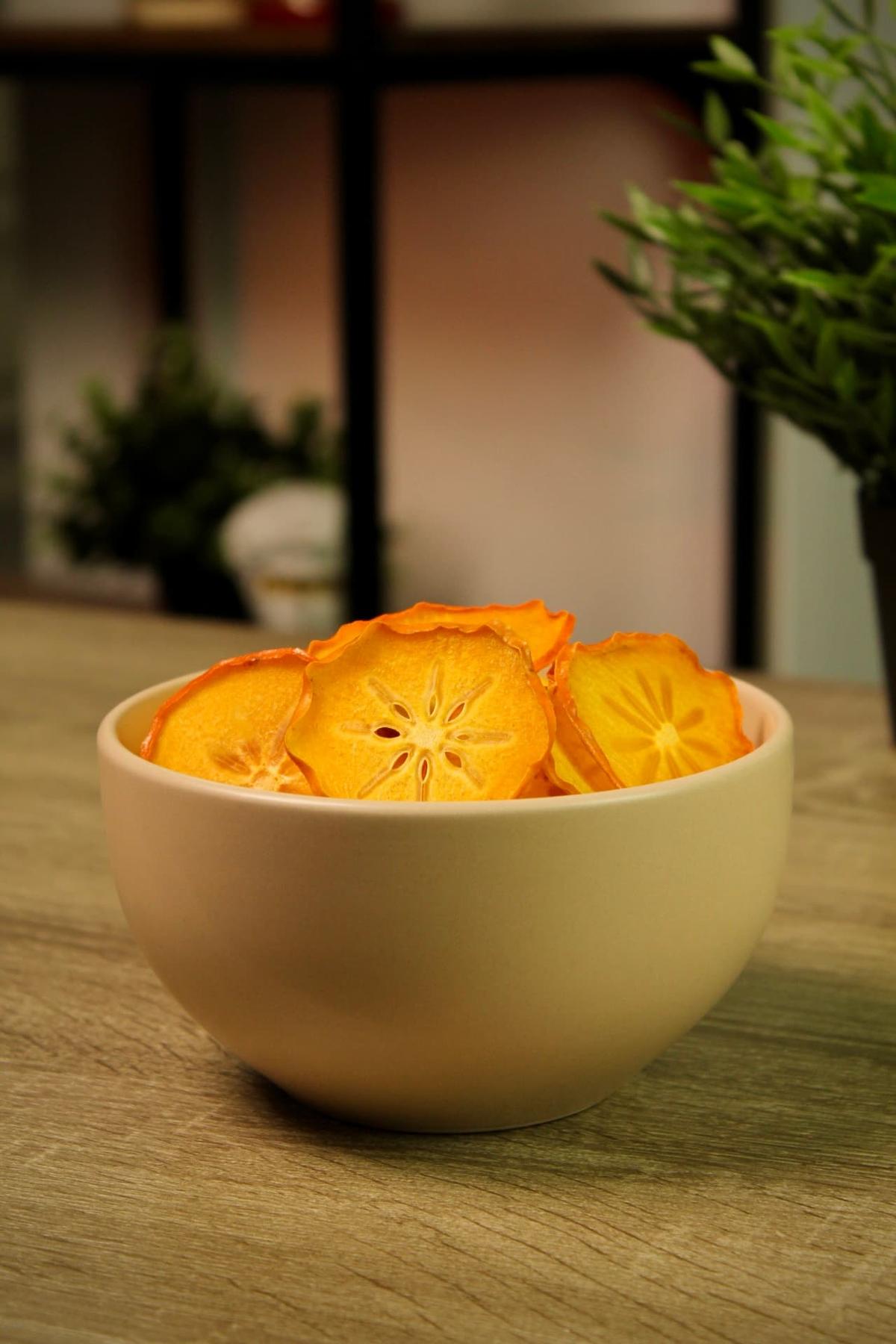 Persimmon in bowl